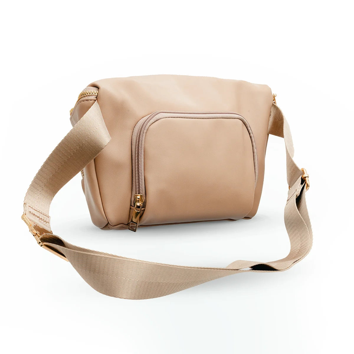 back view of tan cross body bag showing zipper storage pocket