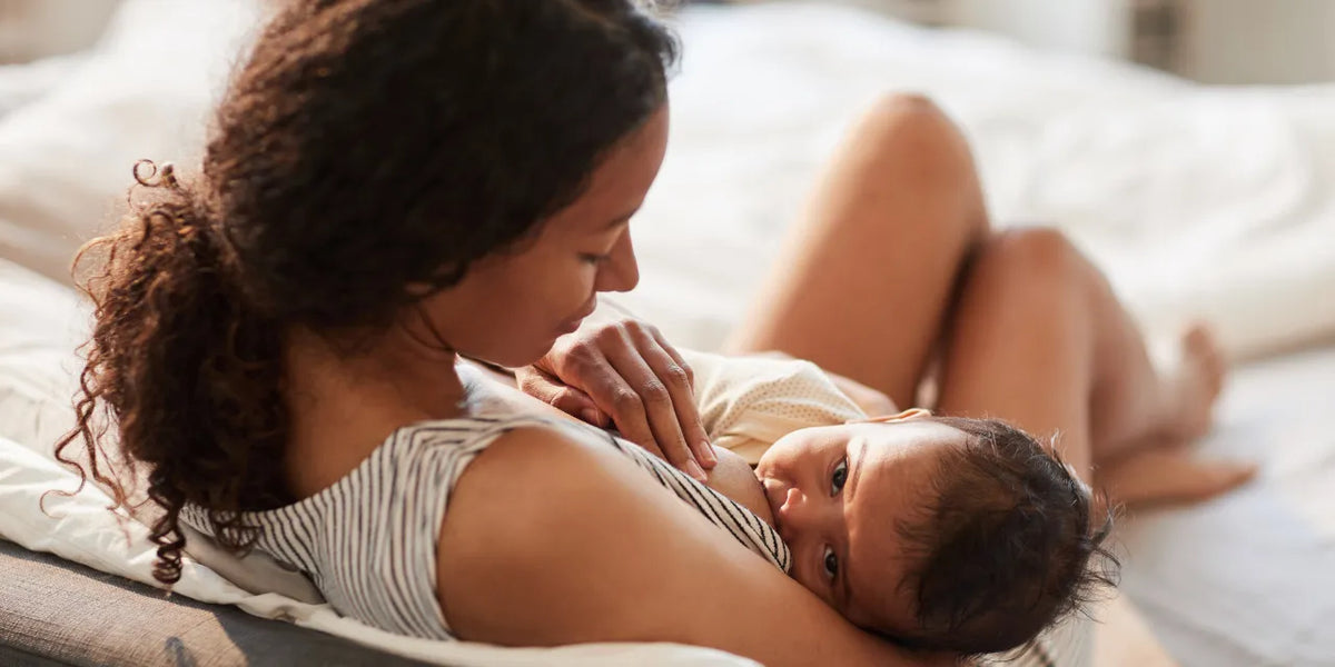 mother breast feeding her baby