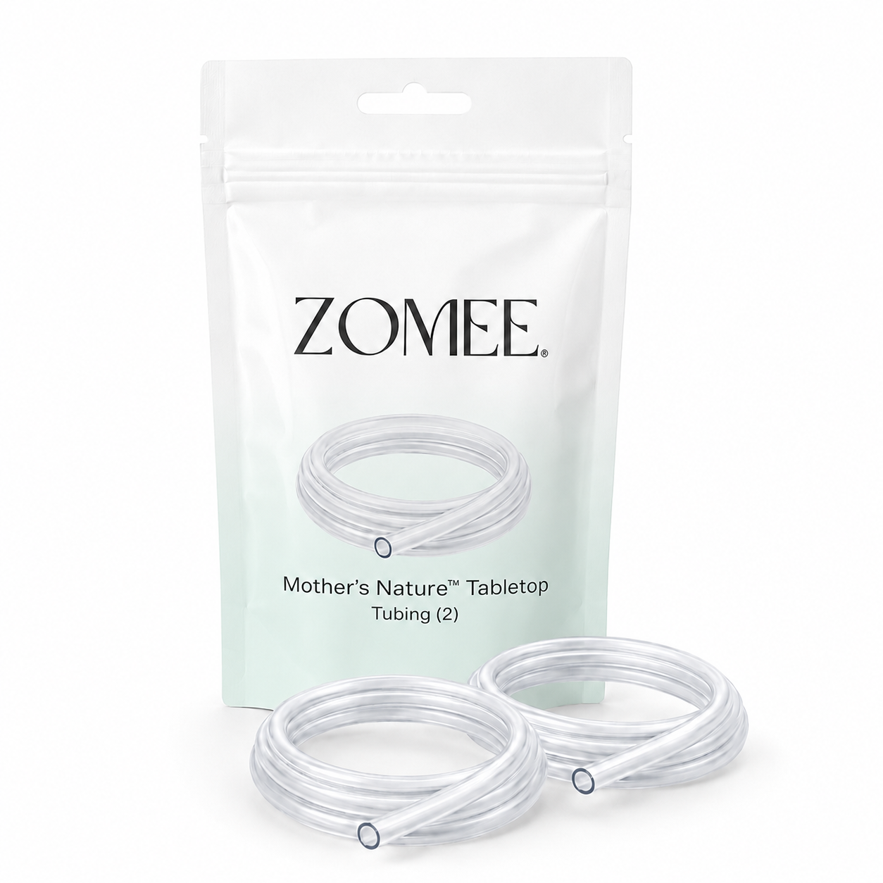 Two clear plastic tubing coils displayed in front of their white and pale green Zomee branded packaging pouch.