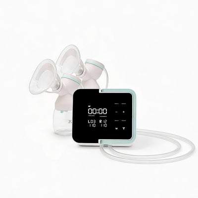 Mother's Nature H1 Breast Pump with tubing connecting to the bottle and flange