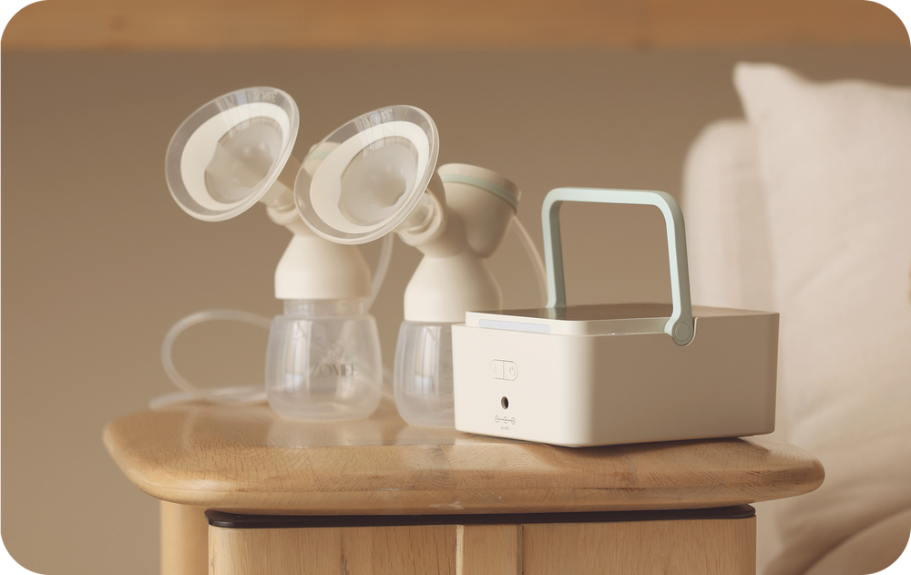 Mother's Nature H1 Hospital-Grade, Dual Motor Breast Pump on top of a bedroom side table