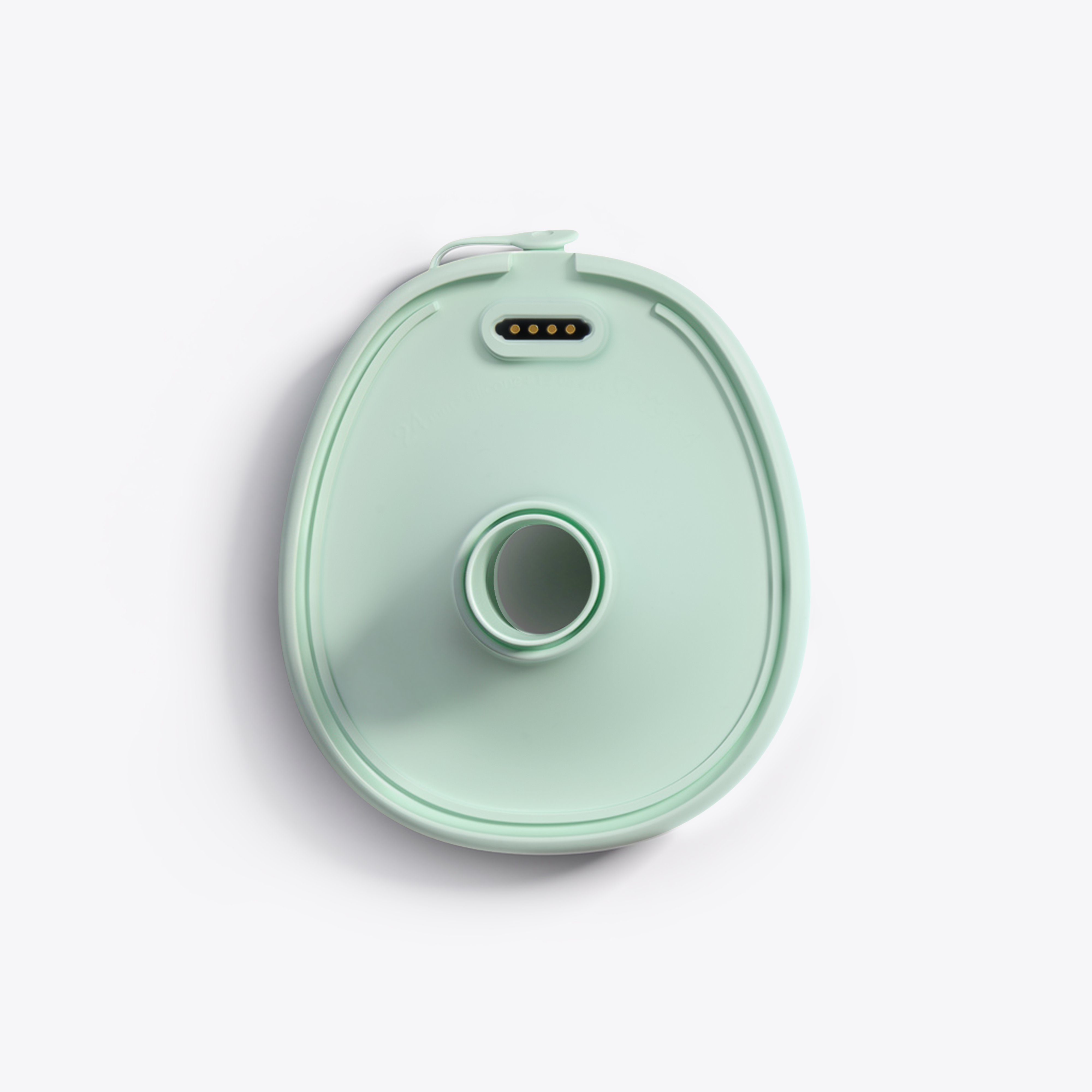 Mother's Nature W1 backside view of the mint green breast shield 