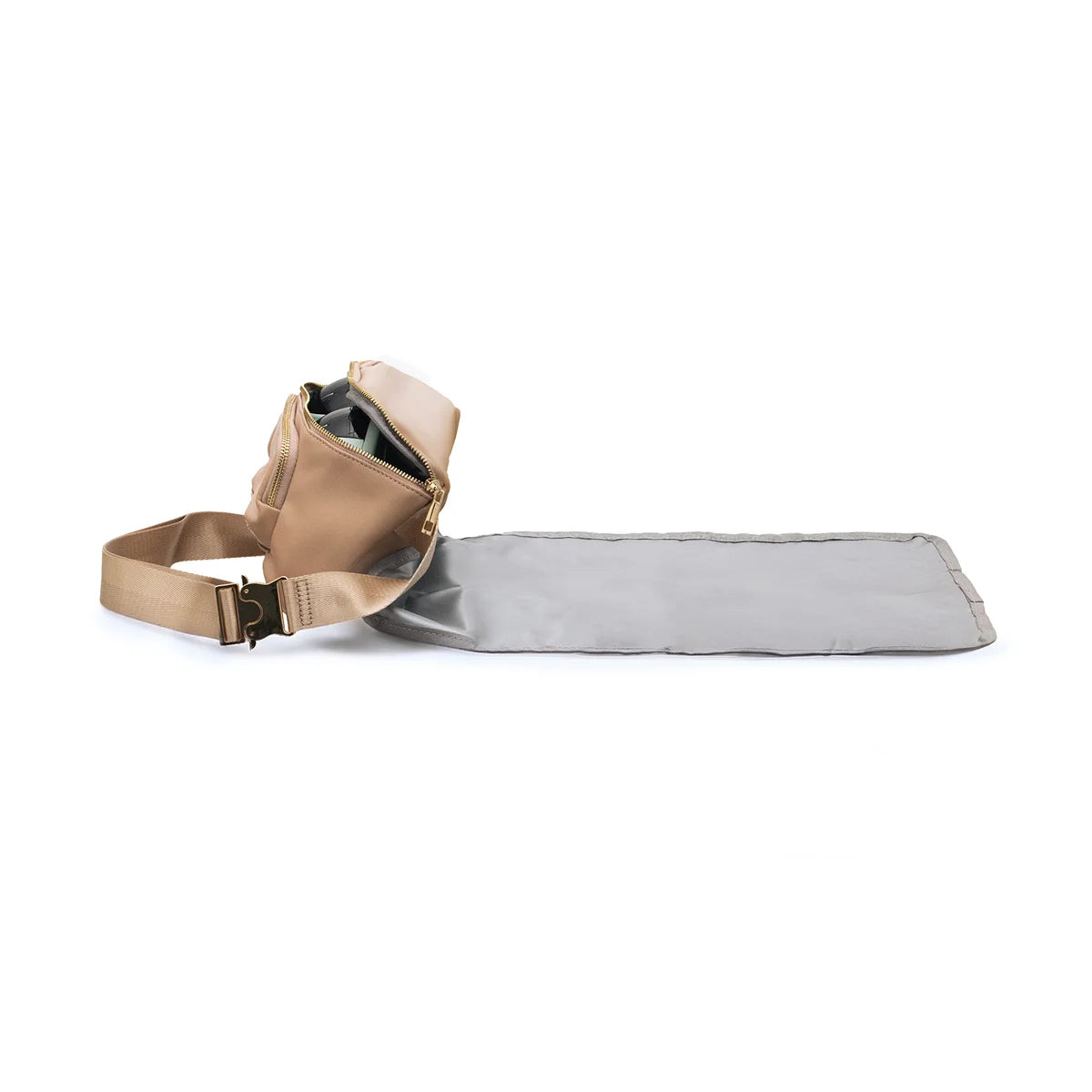tan cross body bag with rolled out changing pad 