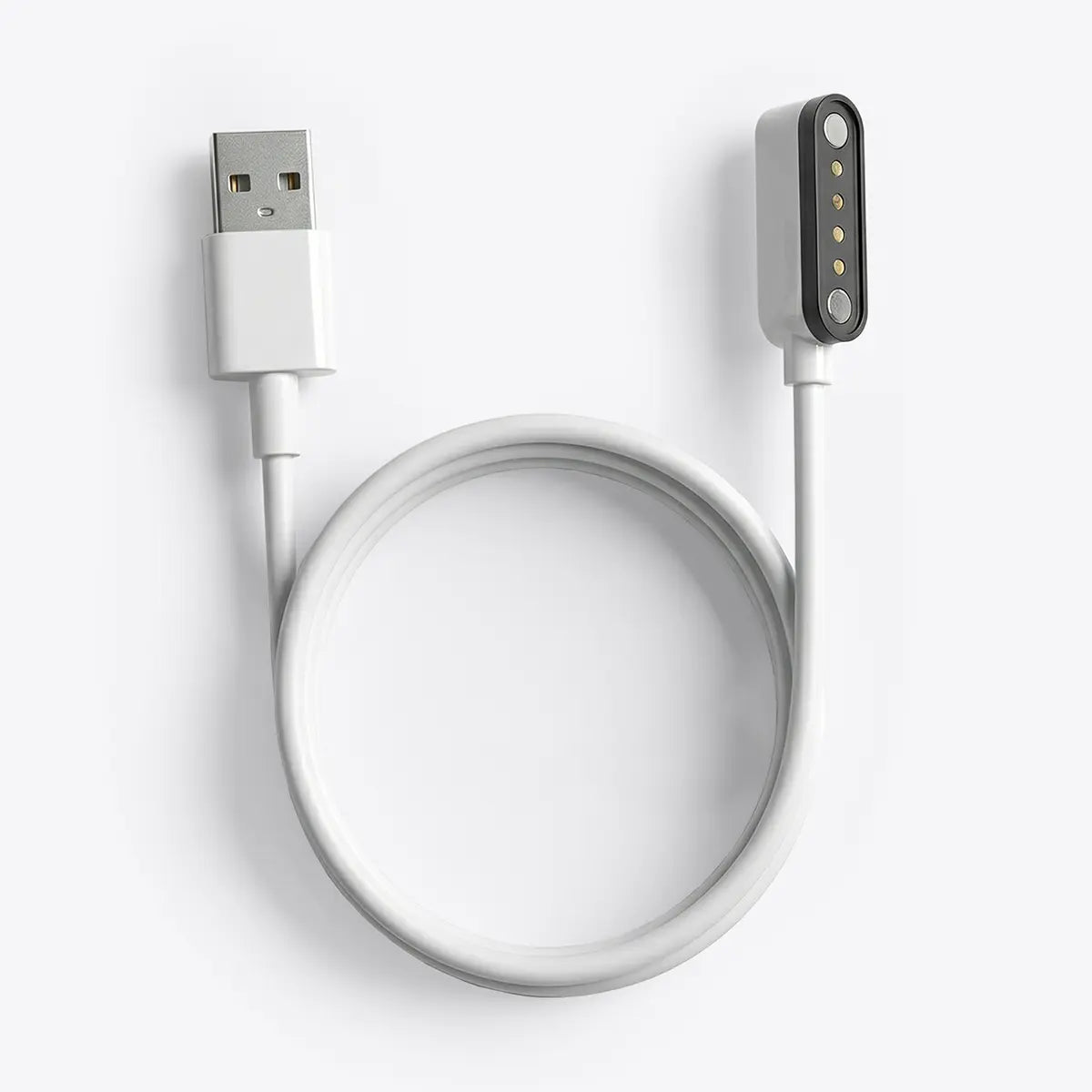 close up of the magnetic charging cable for the zomee mother's nature w1 breast pump